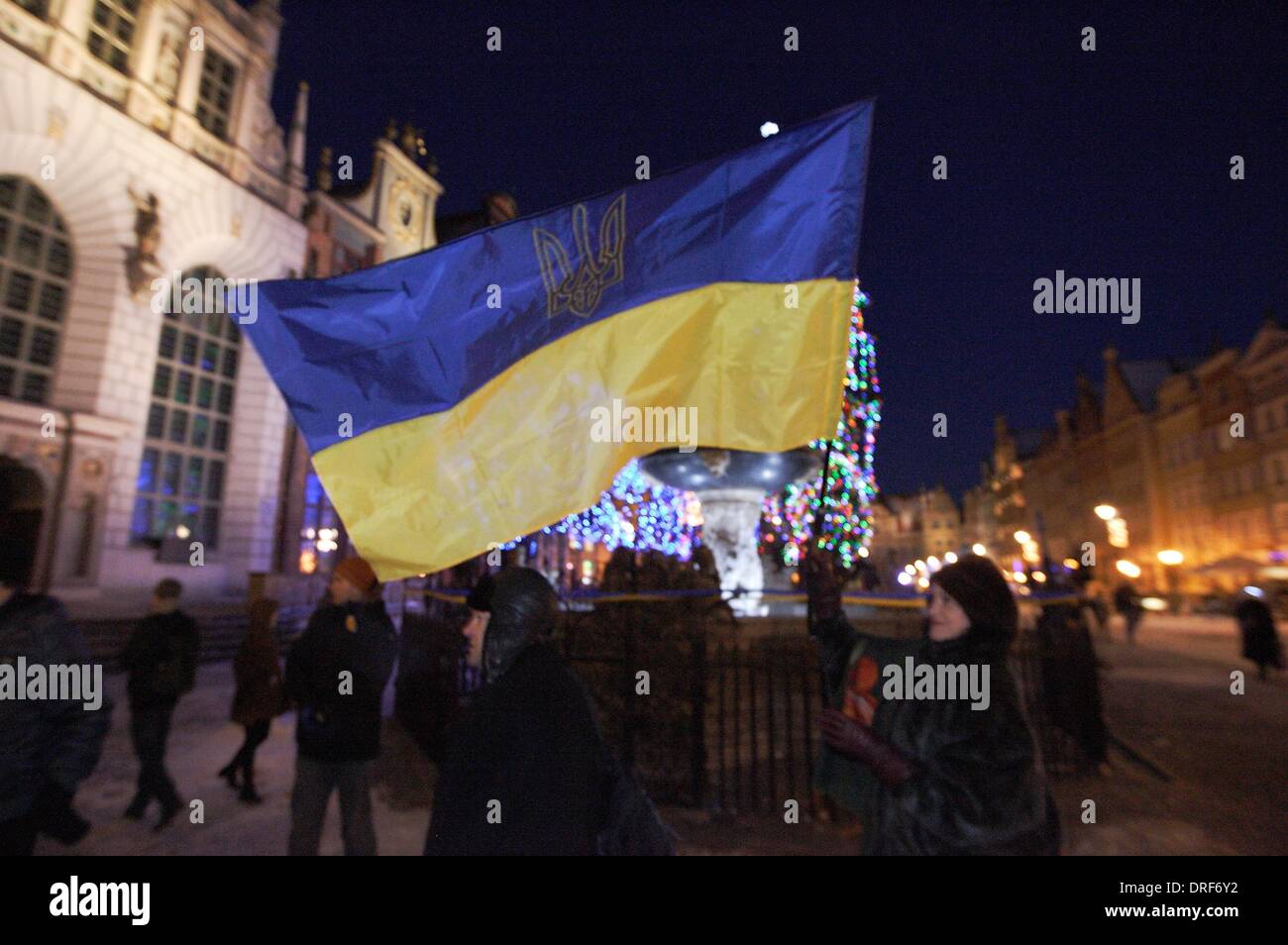 Gdansk, Poland 24th, January 2014 Pro Ukrainian rally in Gdansk to support opposition protesters on Euromaidan in Kiev. Gdansk citizens and Ukrainians living in Poland hold  supporting banners and Ukrainian flags. Credit:  Michal Fludra/Alamy Live News Stock Photo