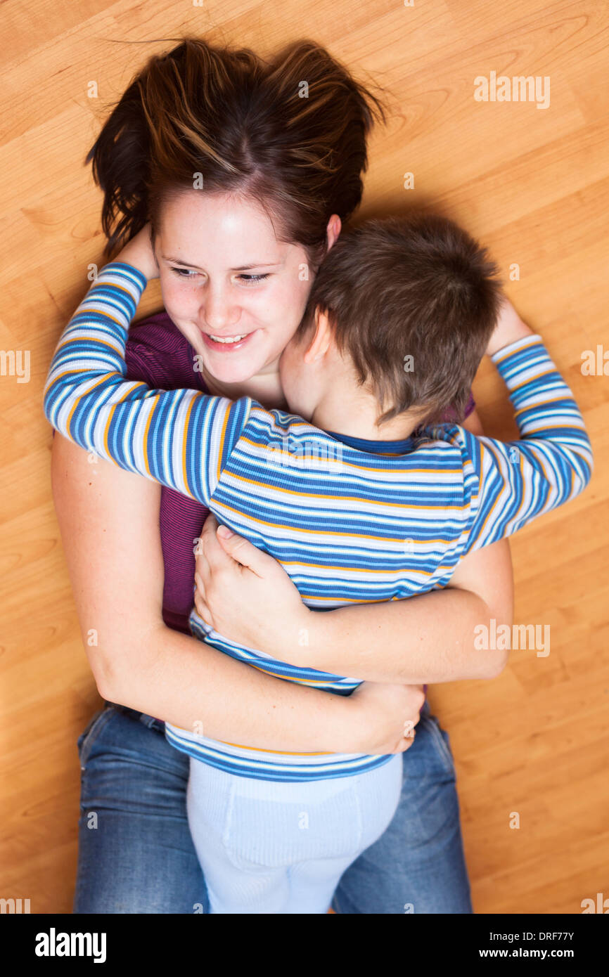 Portrait of happy mother and son hugging Stock Photo