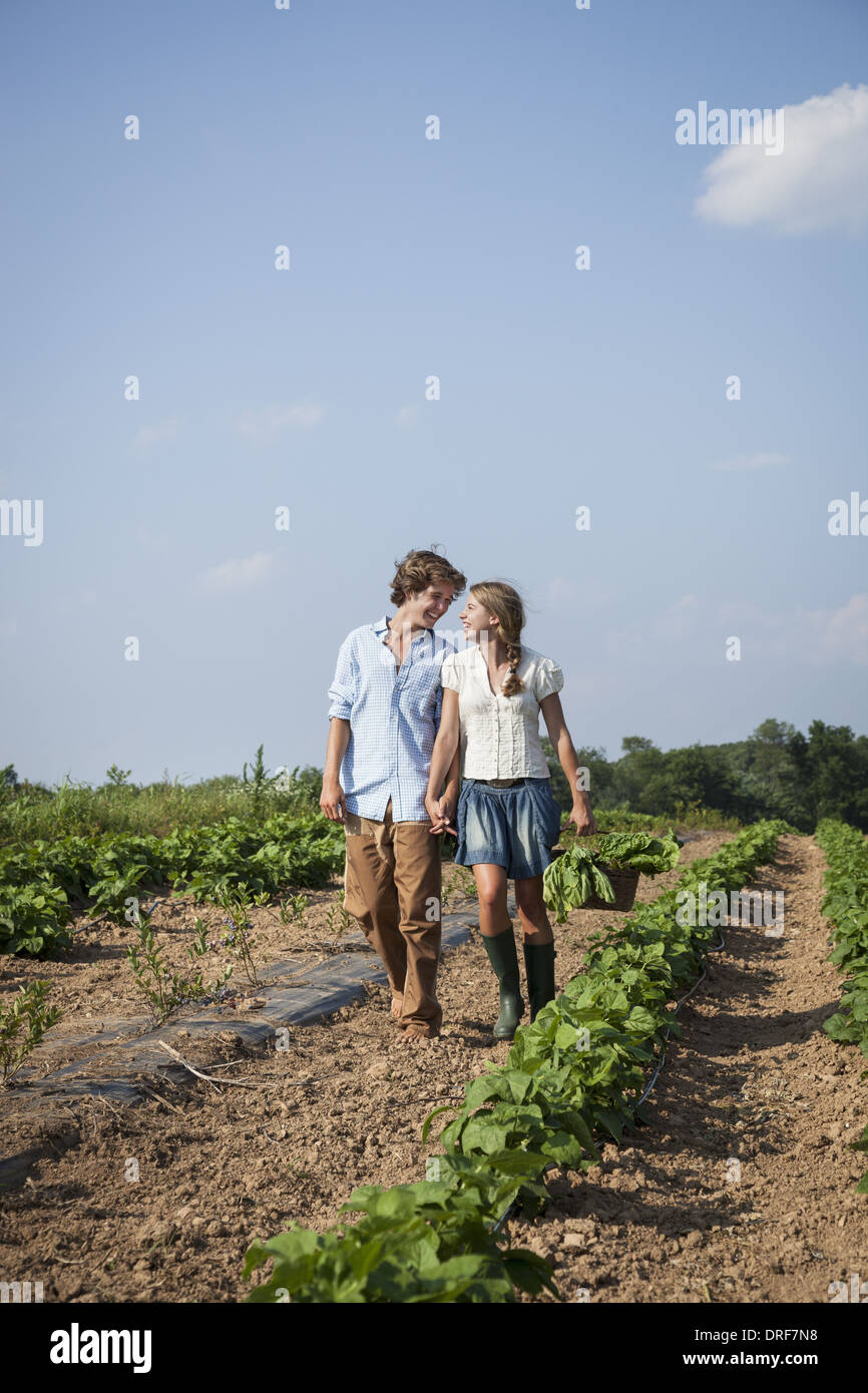 Maryland USA girl boy walking in field holding hands Stock Photo Alamy