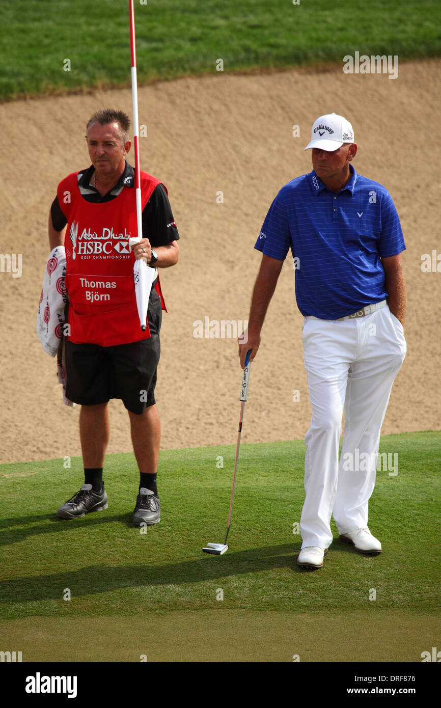 Thomas Bjørn playing in the 2014 Abu Dhabi HSBC Golf Championship. The championship is a PGA European Tour event. Stock Photo