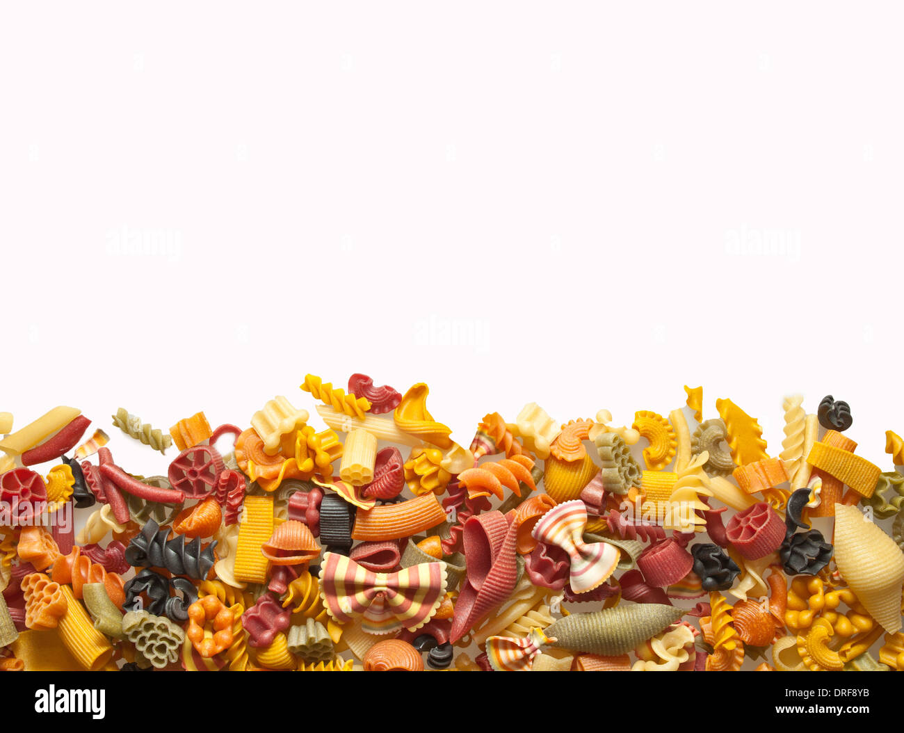 Colorful pasta mix isolated on white background Stock Photo