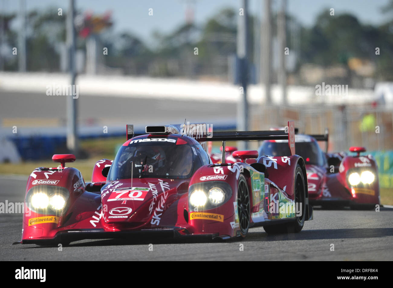 Daytona, USA. 23rd Jan, 2014. The Tudor United Sportcar Championship Rolex 24 Hours of Daytona Practise which was newly formed by the merge of Grand-Am series and the American Le Mans Series . #70 SPEEDSOURCE MAZDA MAZDA SYLVAIN TREMBLAY (USA) TOM LONG (USA) JAMES HINCHCLIFFE (USA) Credit:  Action Plus Sports/Alamy Live News Stock Photo