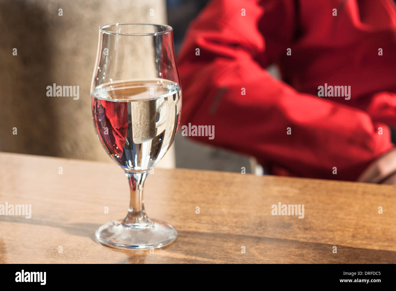 Glass of water on the table. Stock Photo