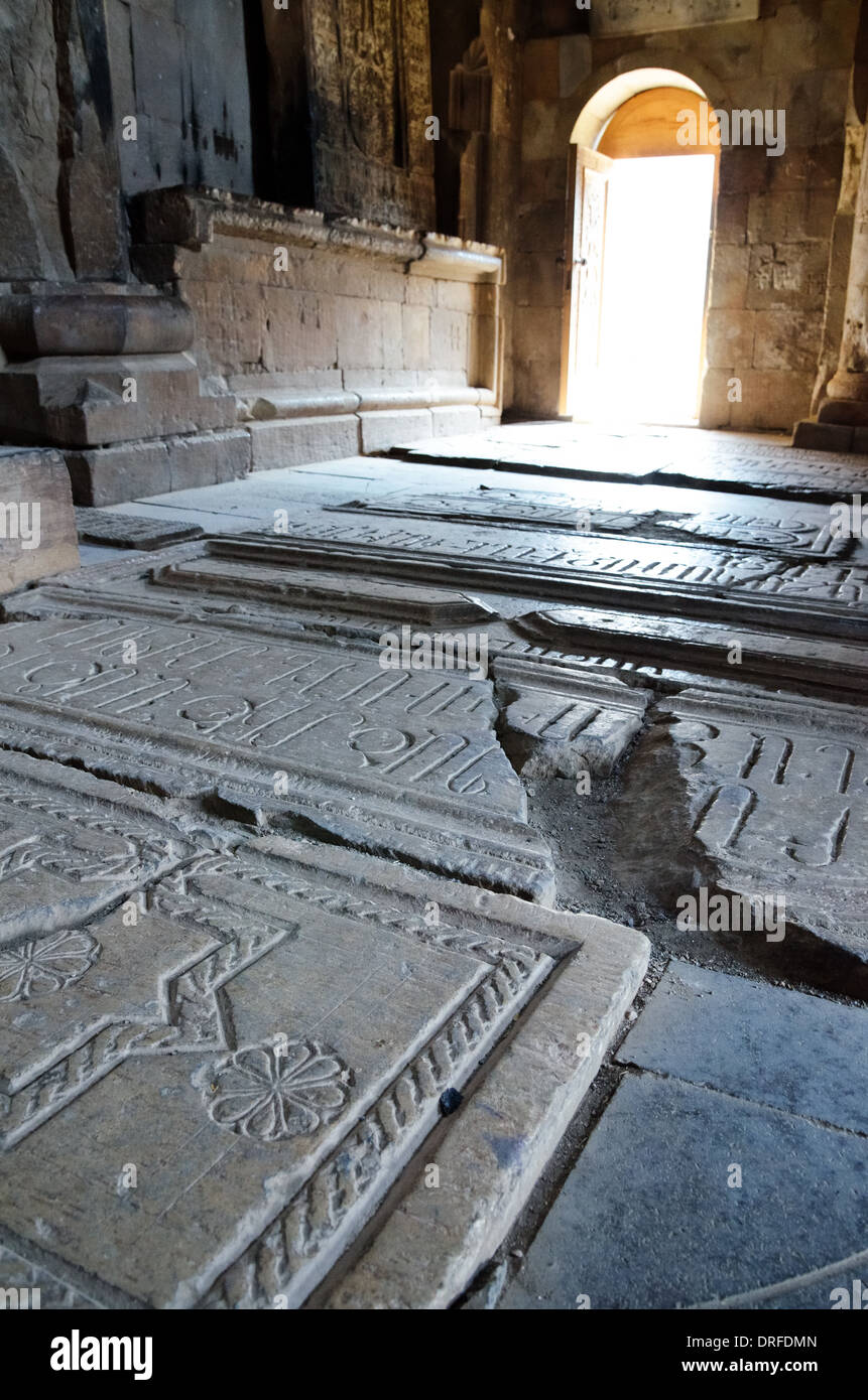 Gravestones on the floor of St. Karapet church in the Noravank monastery, Armenia Stock Photo