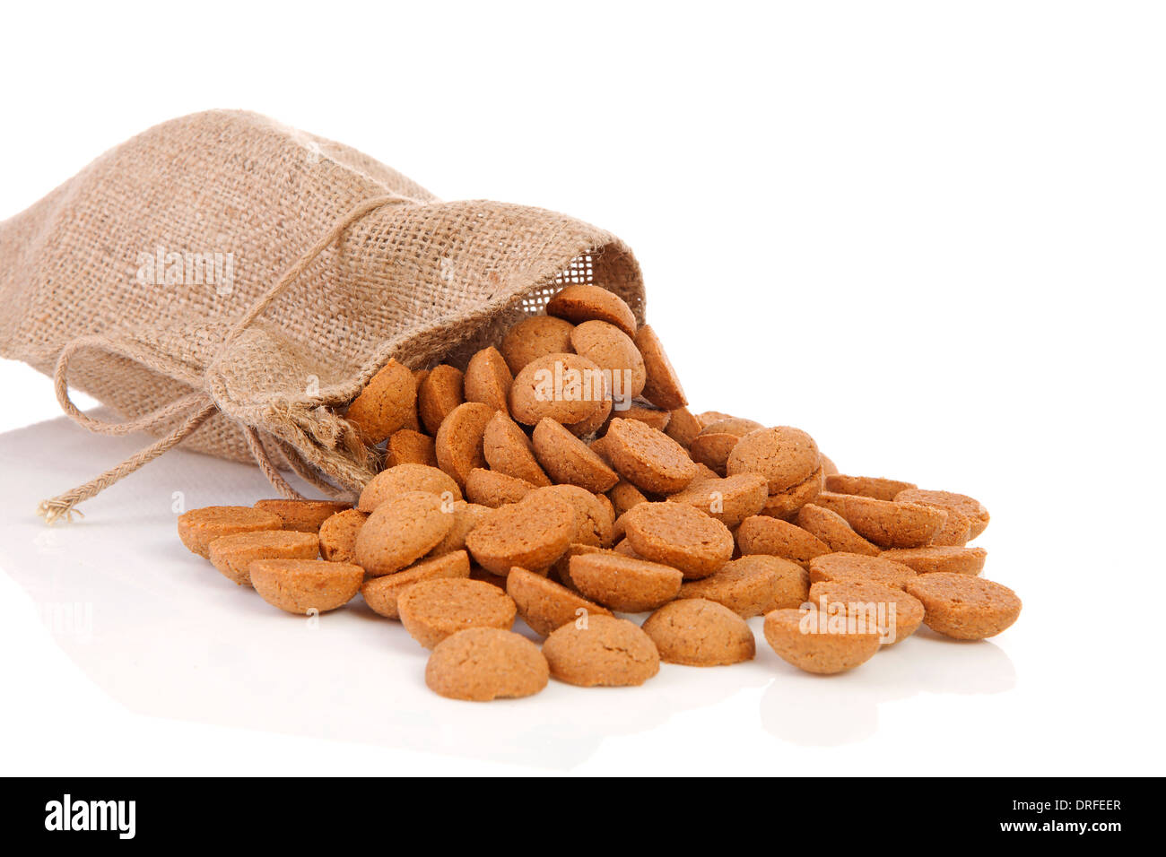 inkt Symptomen Smeltend jute bag with ginger nuts (pepernoten) Dutch tradition for Sinterklaas over  white background Stock Photo - Alamy
