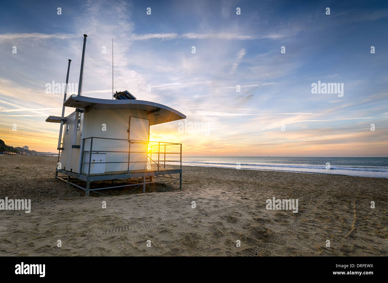A Lifeguard hut on at sunrise at Durley chine on Bournemouth beach in Dorset Stock Photo