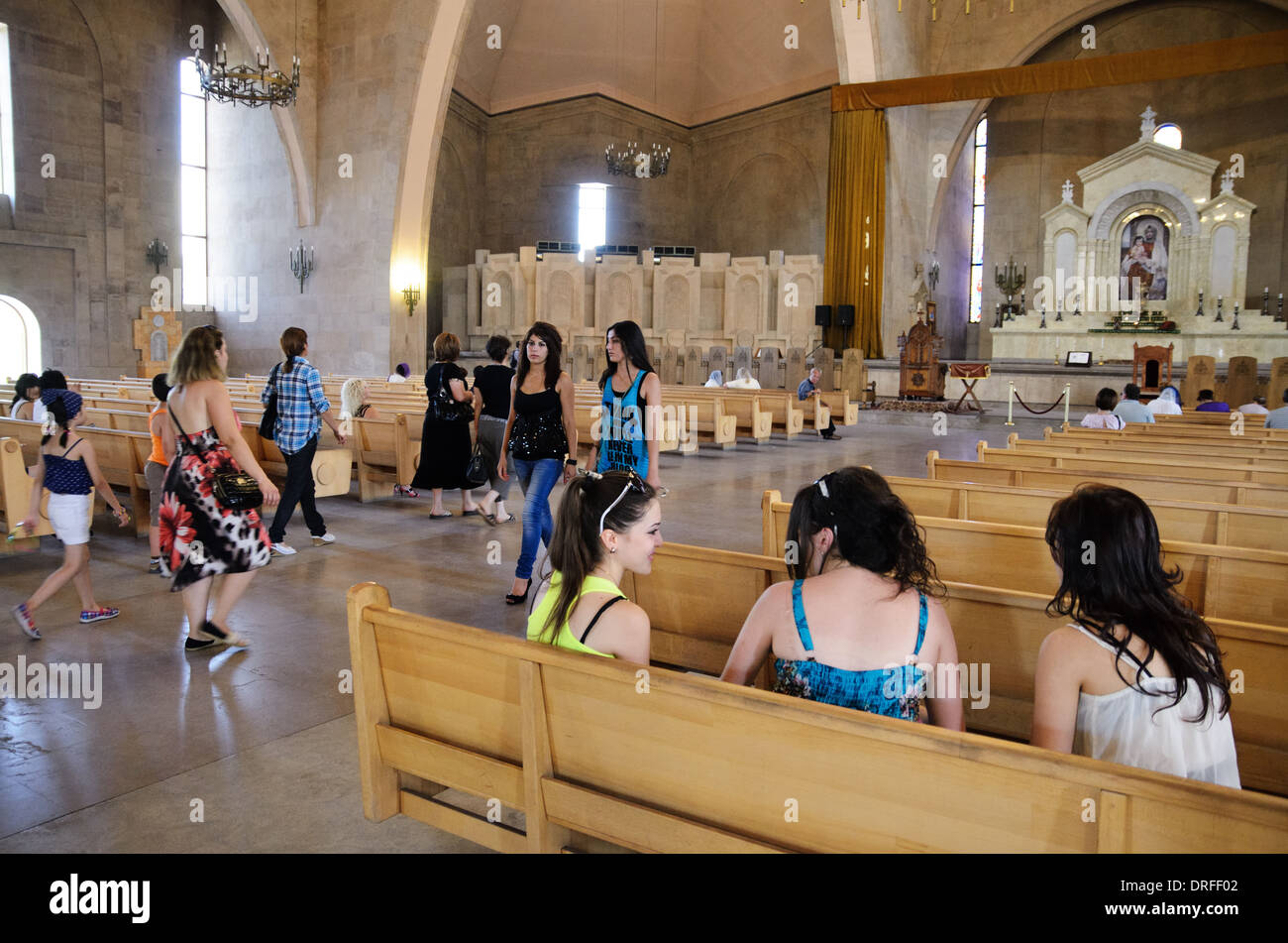 People come for praying in Saint Gregory the Illuminator Cathedral, Yerevan, Armenia Stock Photo