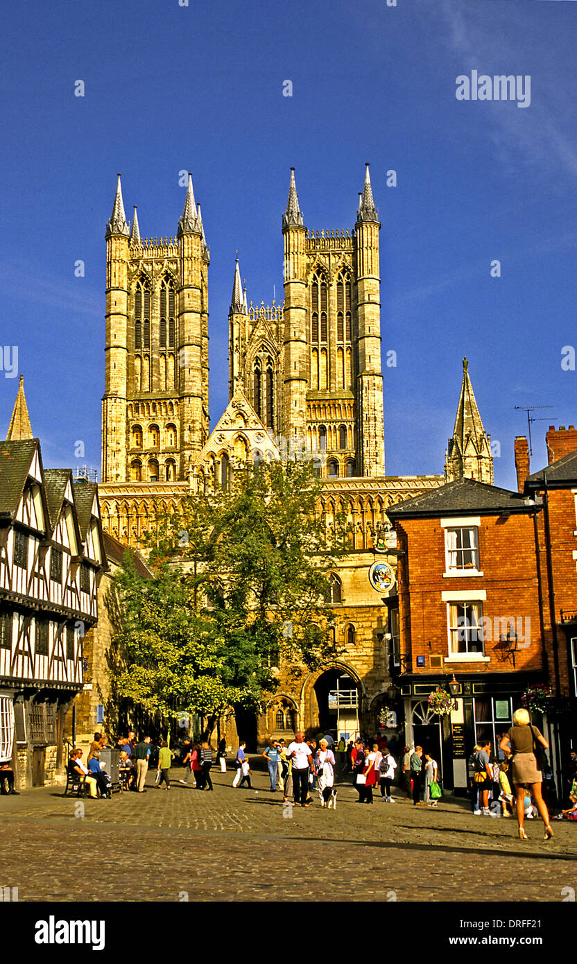 The West Front of Lincoln Cathedral is imposing when viewed from the square between Cathedral and Castle. Stock Photo