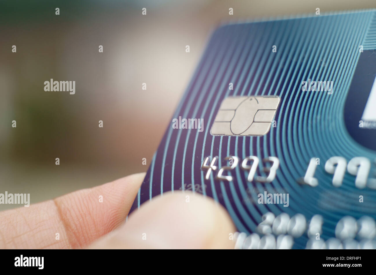 hand holding credit card with embedded chip Stock Photo Alamy