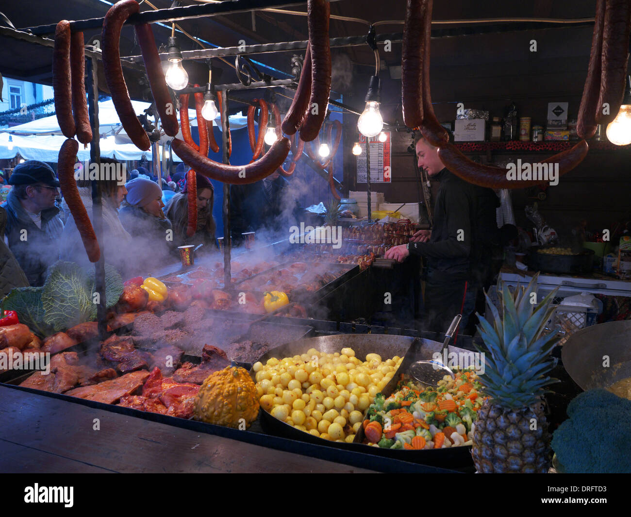 Traditional food stall at the Christmas markets in Krakow, Poland Stock Photo