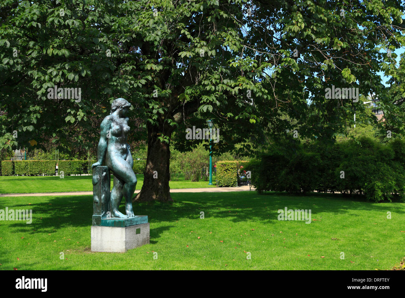The bronze statue, Dansk pige (Danish girl), in Bergen city, Norway, during the summer. The