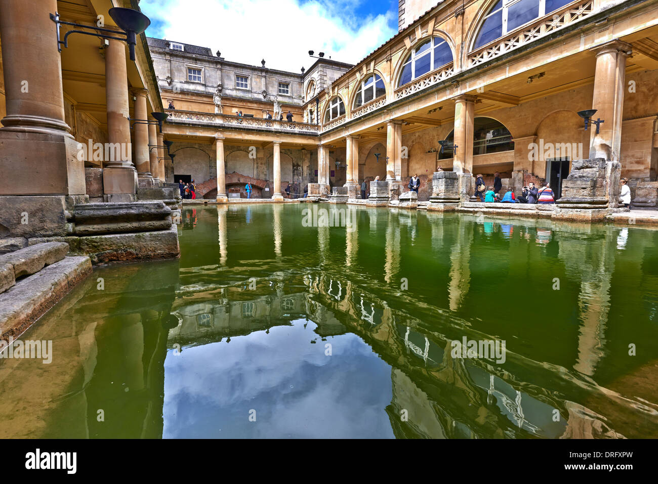 The Roman Baths complex is a site of historical interest in the English city of Bath Stock Photo