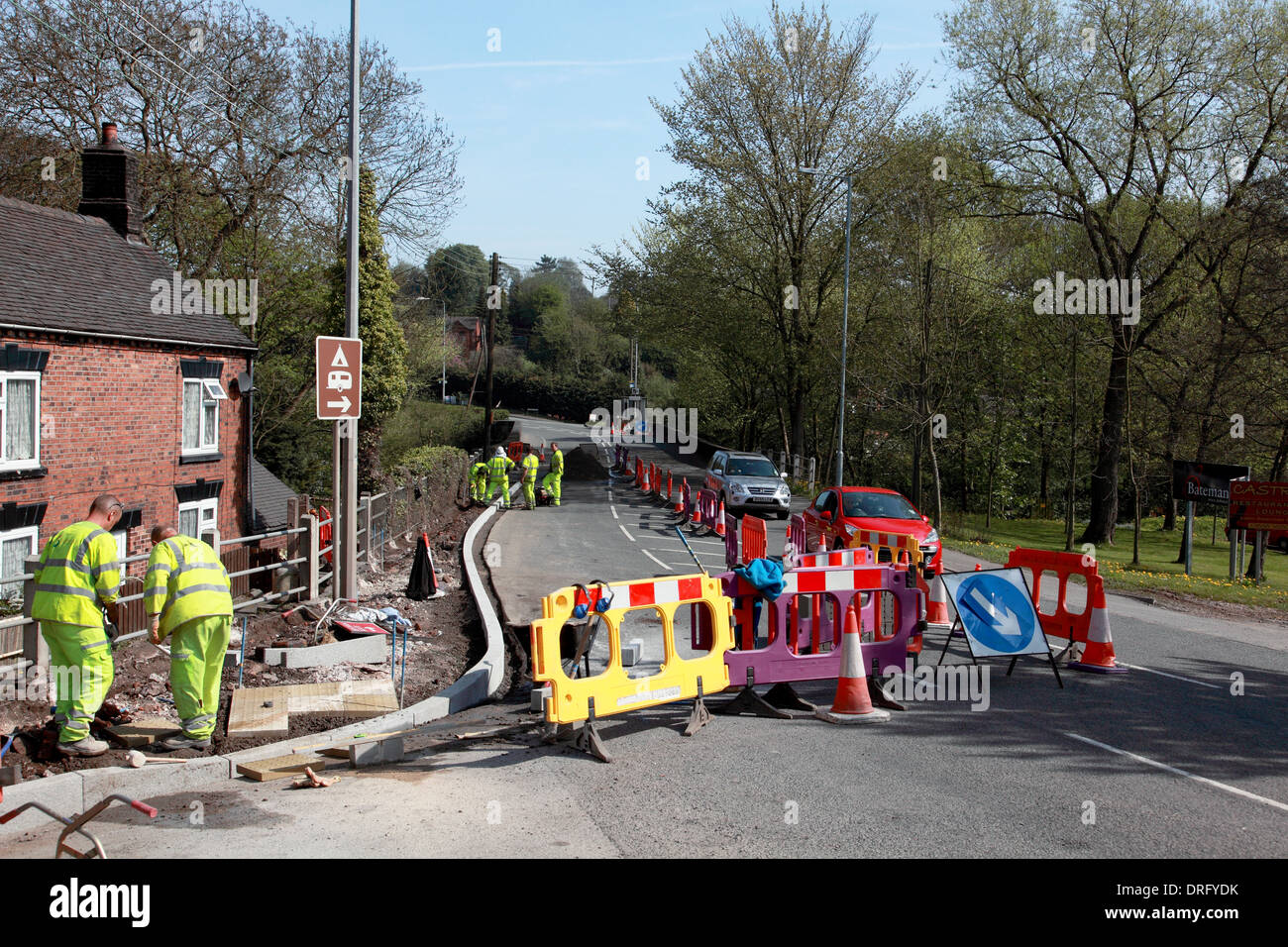 Installation of a new kerb and pavement on the A520 Cheadle Road at