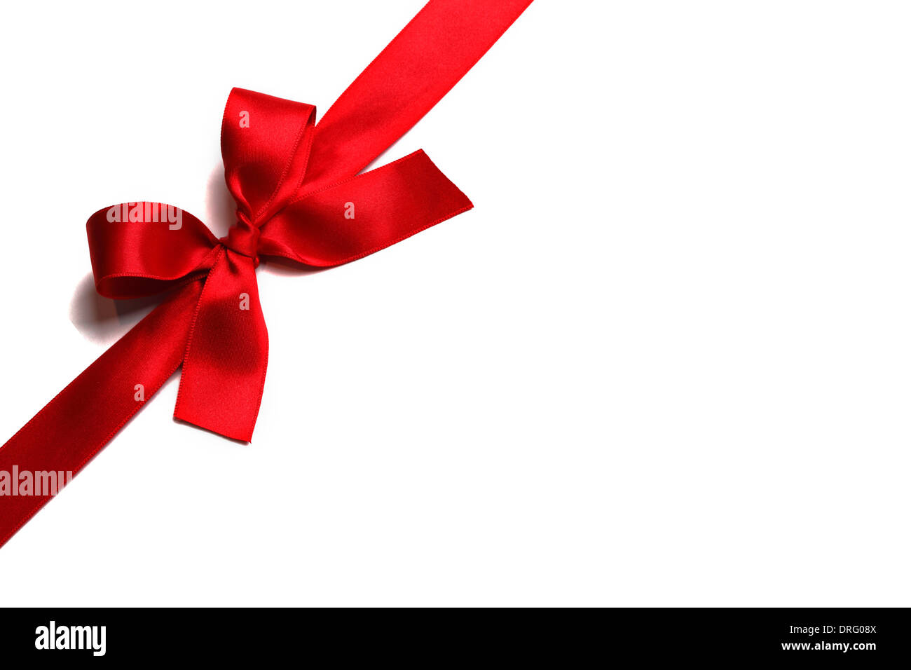Red ribbon with bow isolated on white background Stock Photo - Alamy
