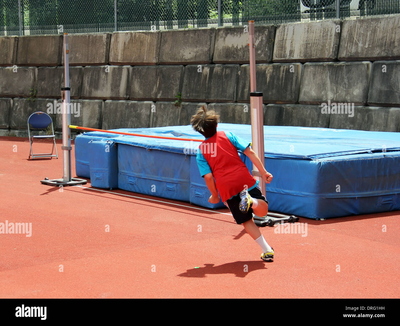 Boy on track and field competition Stock Photo Alamy