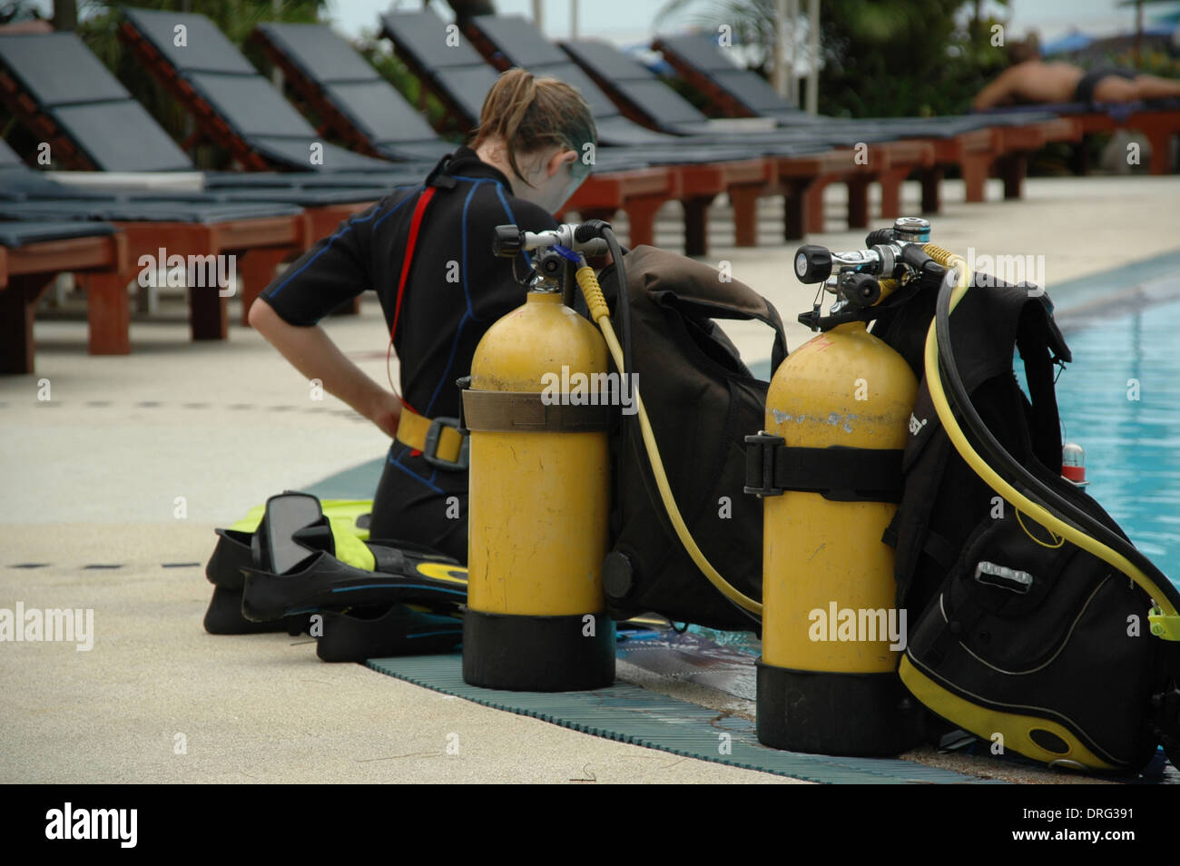 Diver at the swimmingpool getting ready Stock Photo