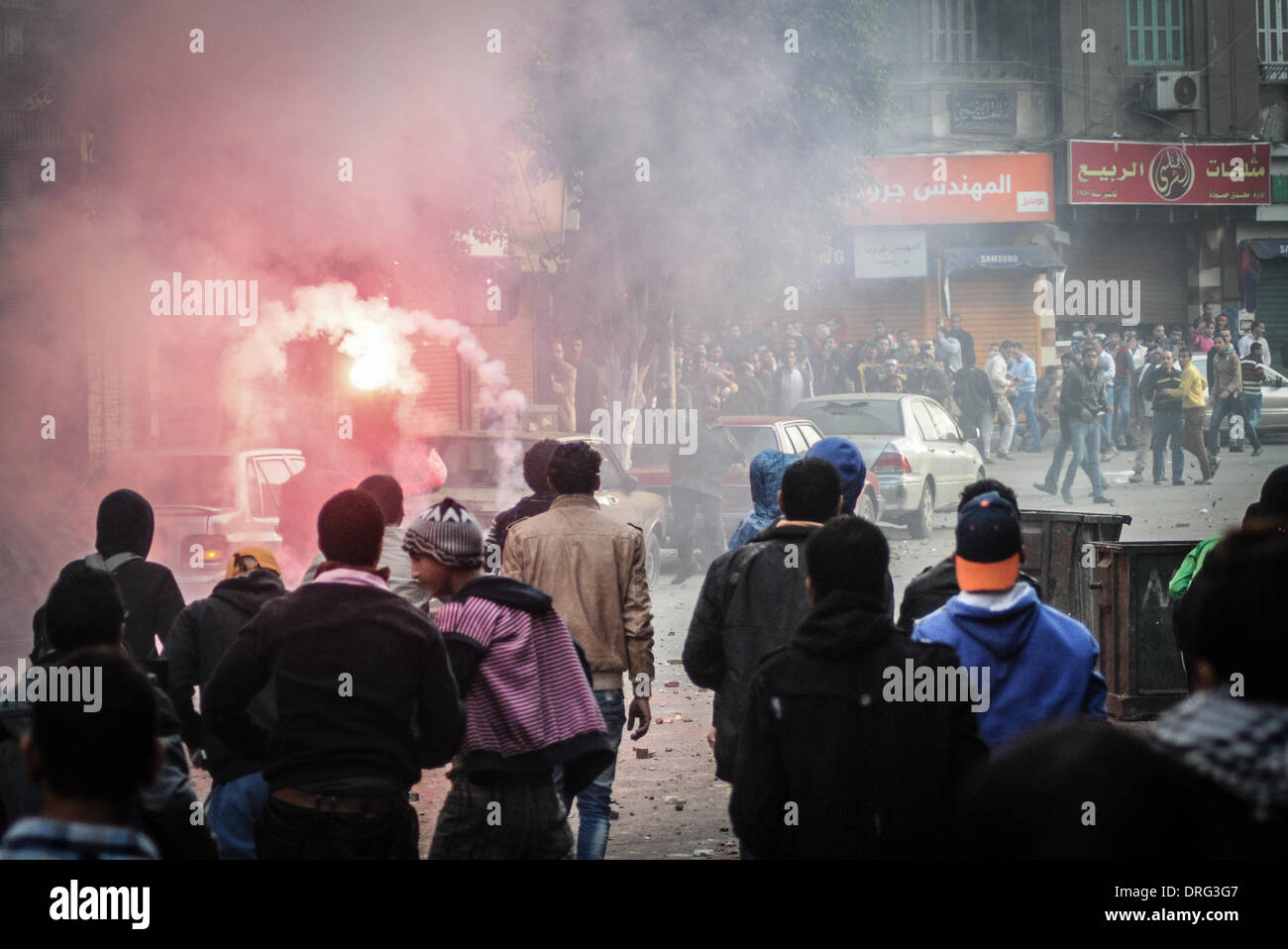 Cairo, Egypt. 25th Jan, 2014. Egyptian riot police have fired tear gas ...