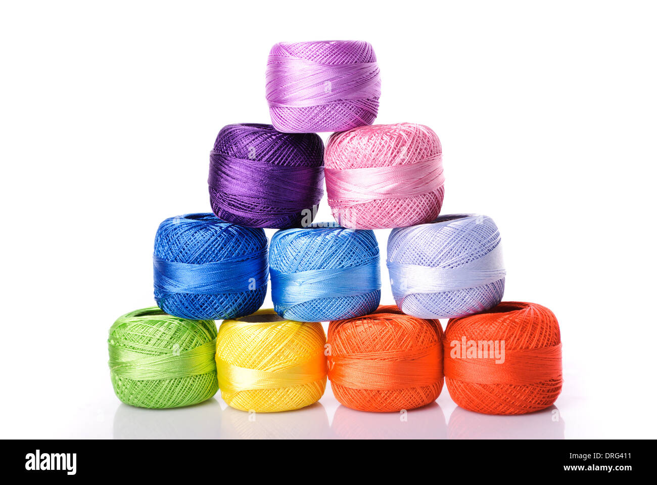 Different color threads isolated on white Stock Photo - Alamy