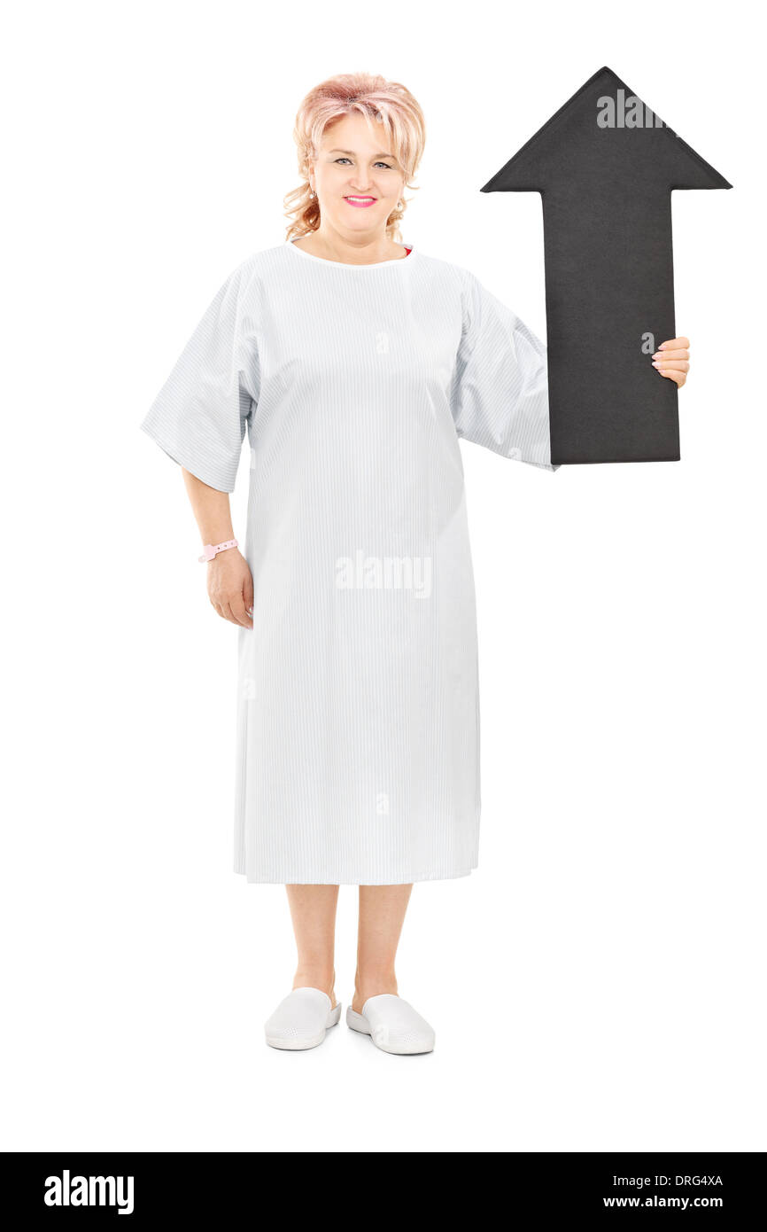 Full length portrait of female patient holding big black arrow Stock ...