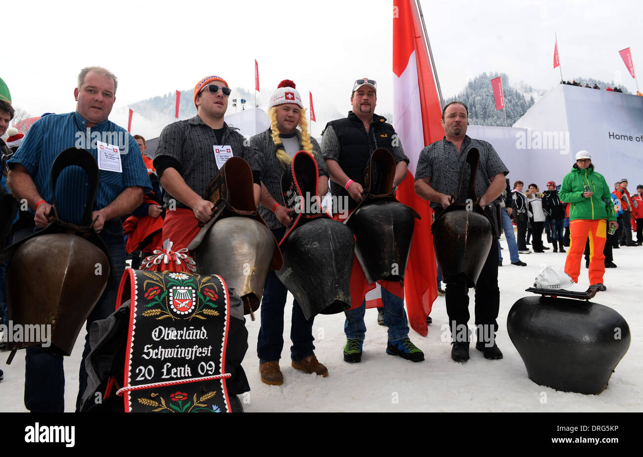 Kitzbuehel, Austria. 25th Jan, 2014. Fans from Switzerland pose cow