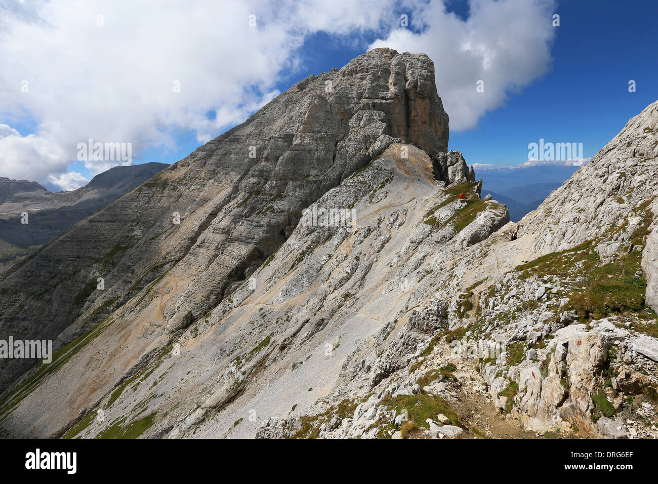 The Latemar mountain massif.  The peak of Cimon del Latemar mountain. M.Rigatti red bivouac. The Dolomites. Trentino. Italian Alps. Stock Photo