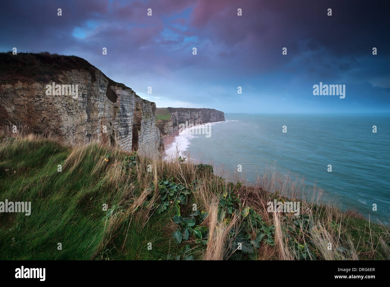 sunrise over cliff in ocean, Etretat, Normandy, France Stock Photo - Alamy