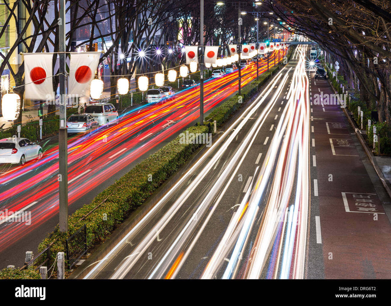Tokyo, Japan flag lined avenue near Harajuku district. Stock Photo
