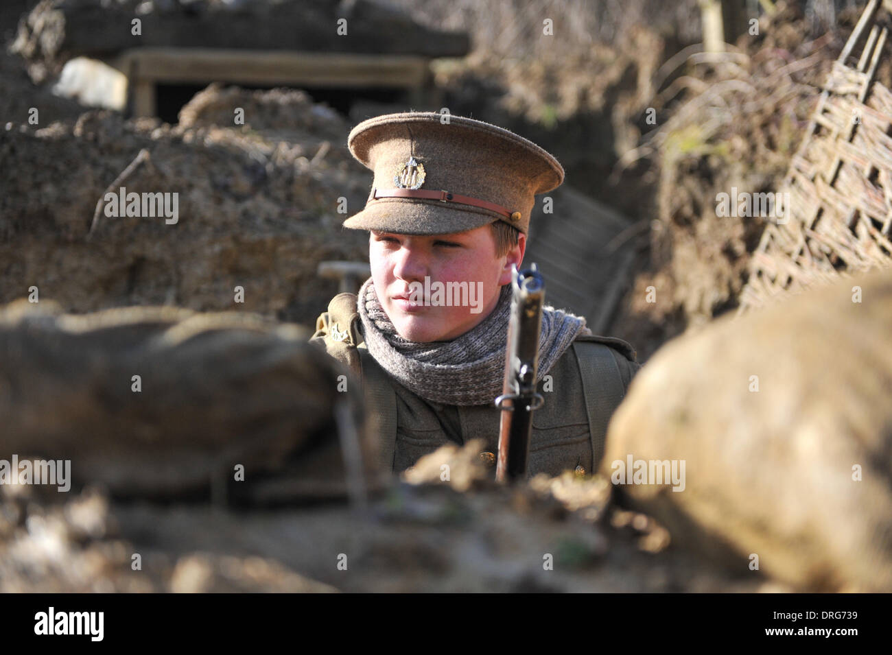 Charlwood, Surrey, UK. 25th January 2014. One of the living history group in the Trench. Credit:  Matthew Chattle/Alamy Live News Stock Photo
