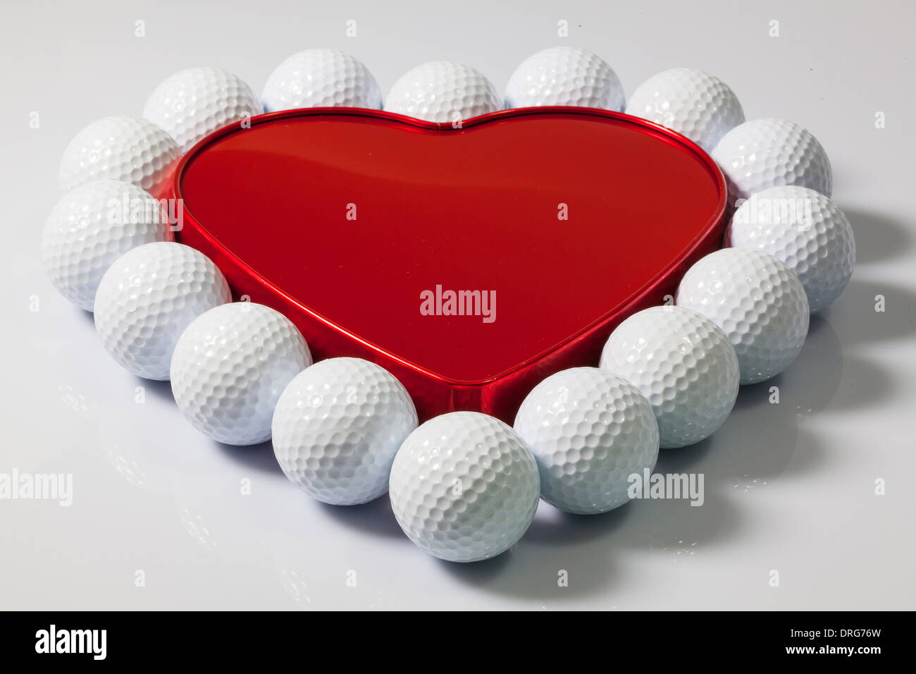 Heart of white golf balls Stock Photo Alamy
