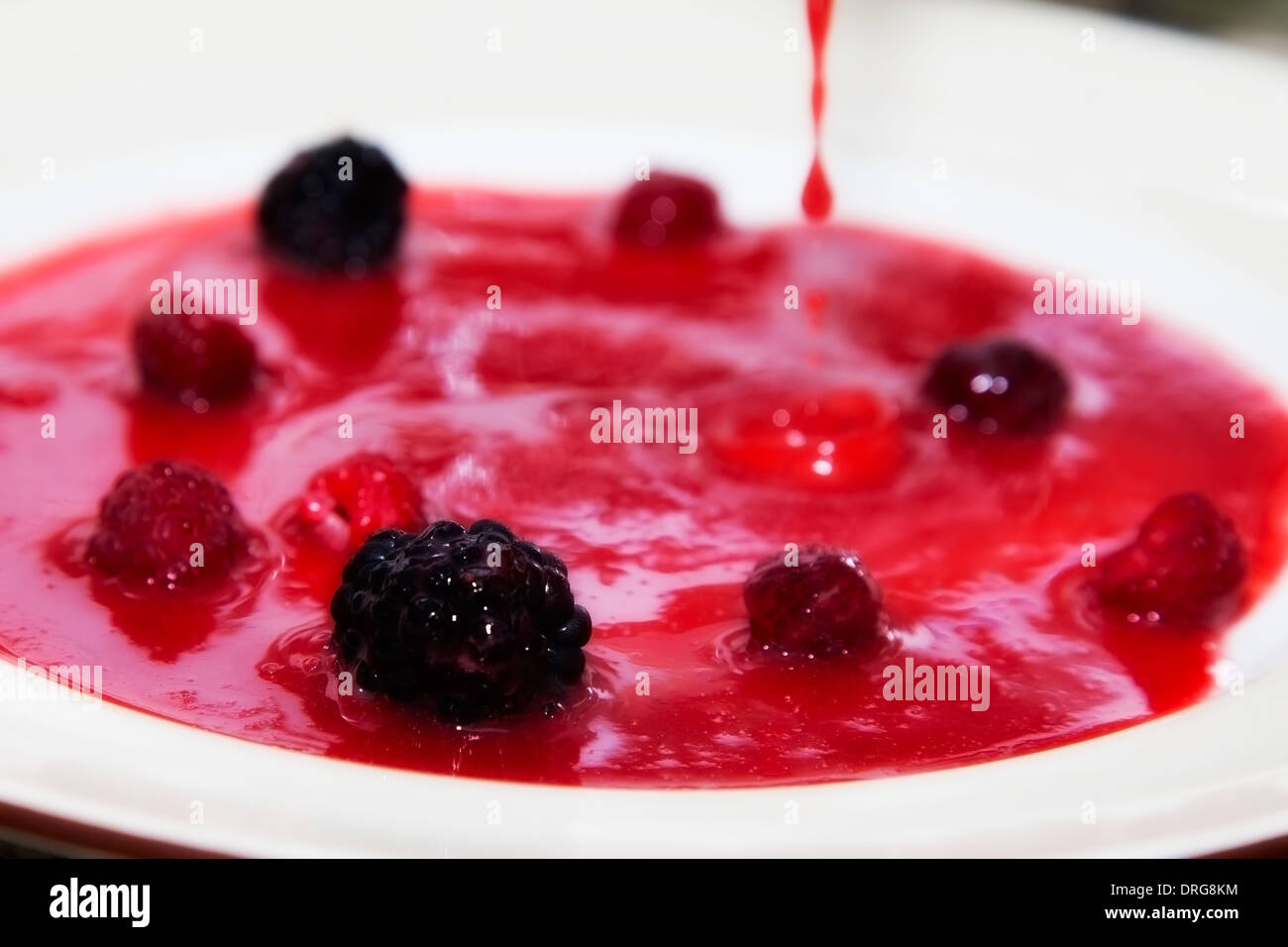 berry jam on plate. sweet food Stock Photo