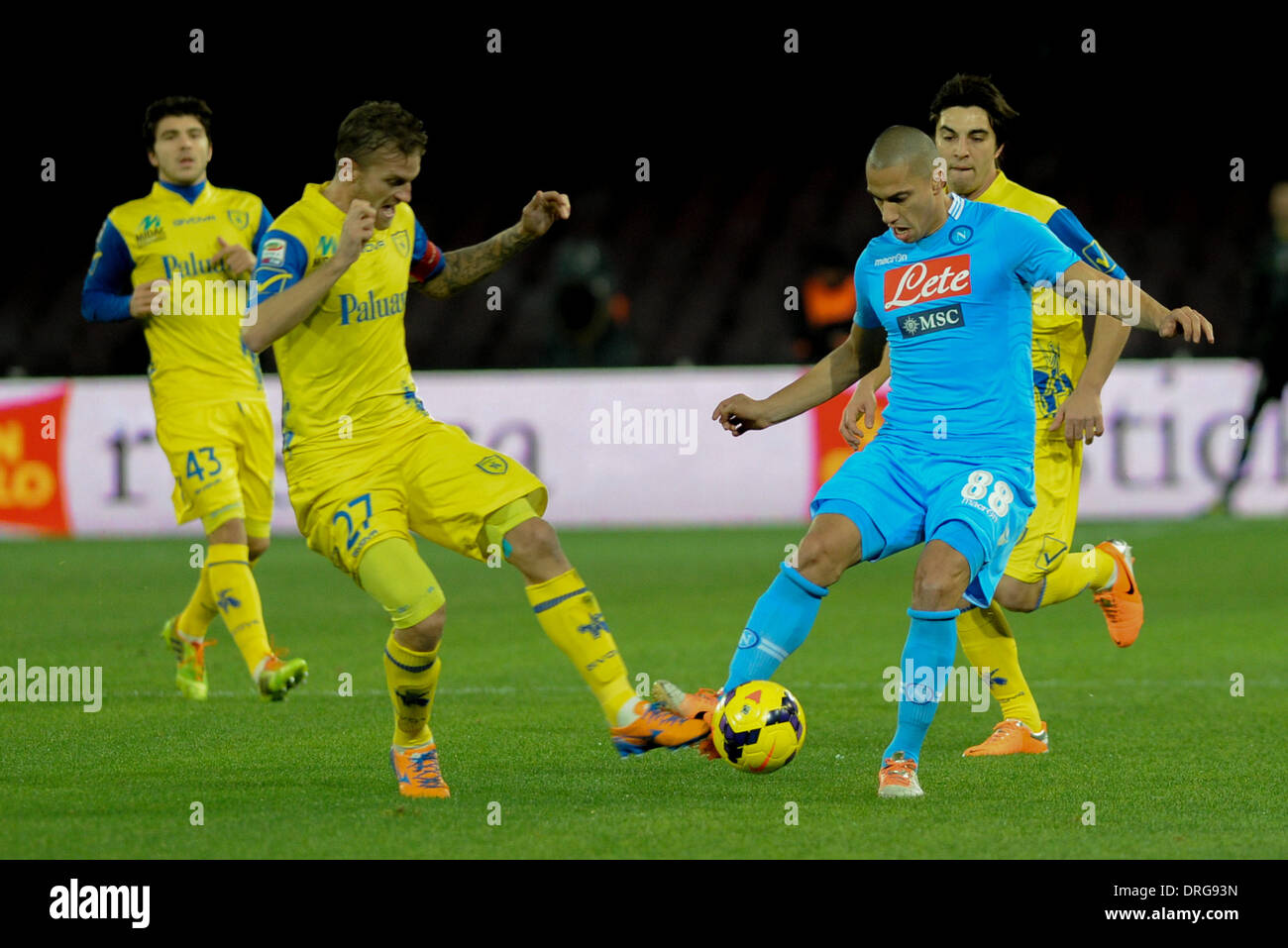 Naples, Italy. 25th Jan, 2014. Gokhan Inler of SSC Napoli Rigoni Luca in action during Football / Soccer : Italian Serie A match between SSC Napoli and AC Chievo Verona at Stadio San Paolo in Naples, Italy, on January 25, 2014. Credit:  Franco Romano/NurPhoto/ZUMAPRESS.com/Alamy Live News Stock Photo