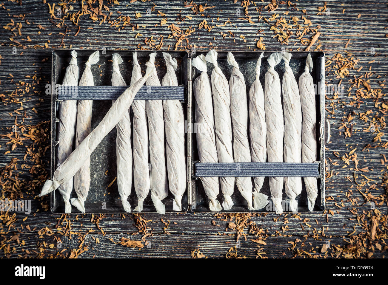Closeup of metal cigarette cases with cigarettes Stock Photo Alamy