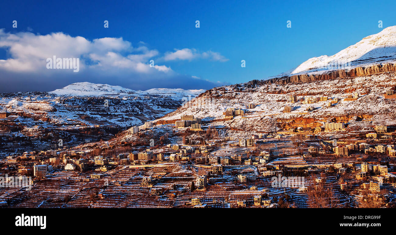 Beautiful landscape of mountainous town in winter, many cozy cottage, eco tourism, Faraya mountain in Lebanon, ski resort Stock Photo
