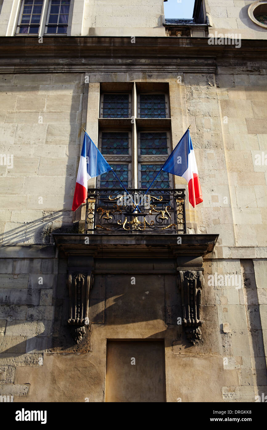French flags on official building in Paris Stock Photo