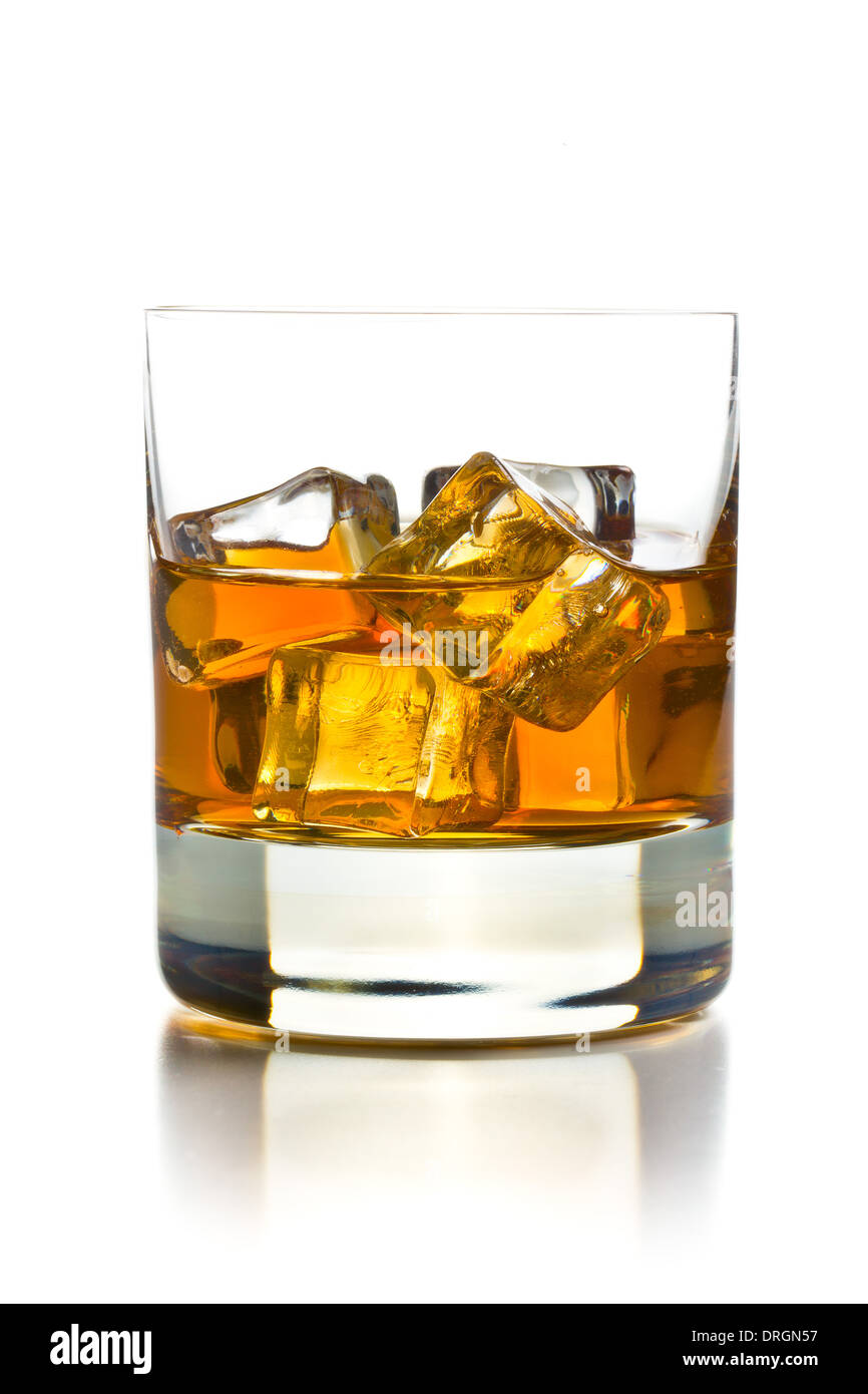 whiskey with ice in glass on white background Stock Photo