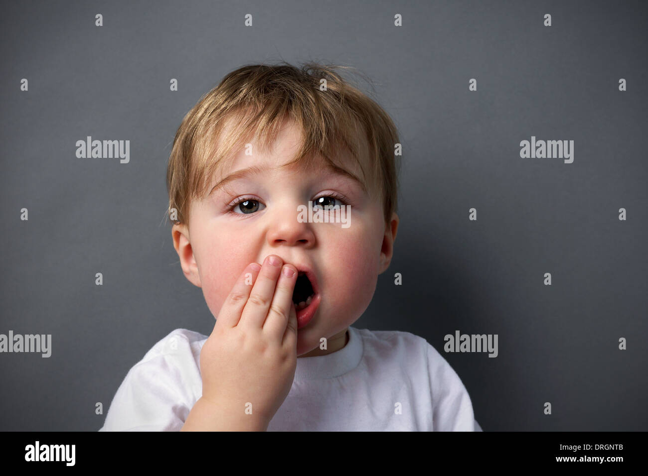 Little boy upset or hurting, toothache or other booboo concept. Stock Photo