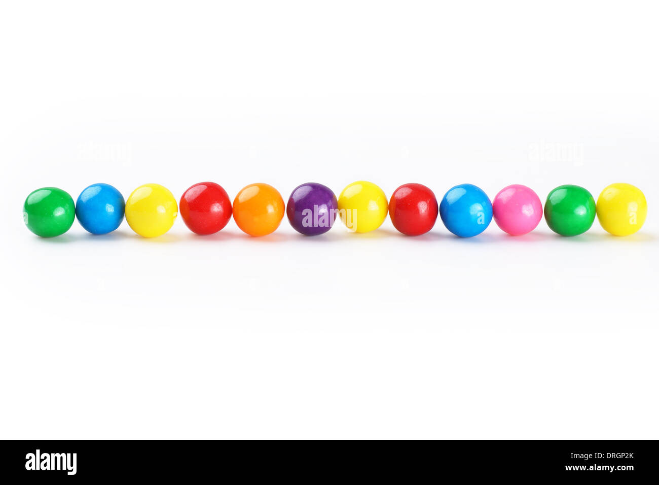 Colorful gumballs border over white background Stock Photo