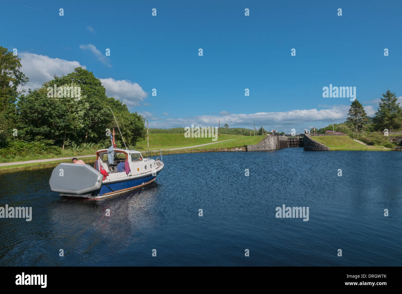 Pleasure boat going through Crinan Canal at Dunardry Locks Argyll & Bute Scotland Stock Photo