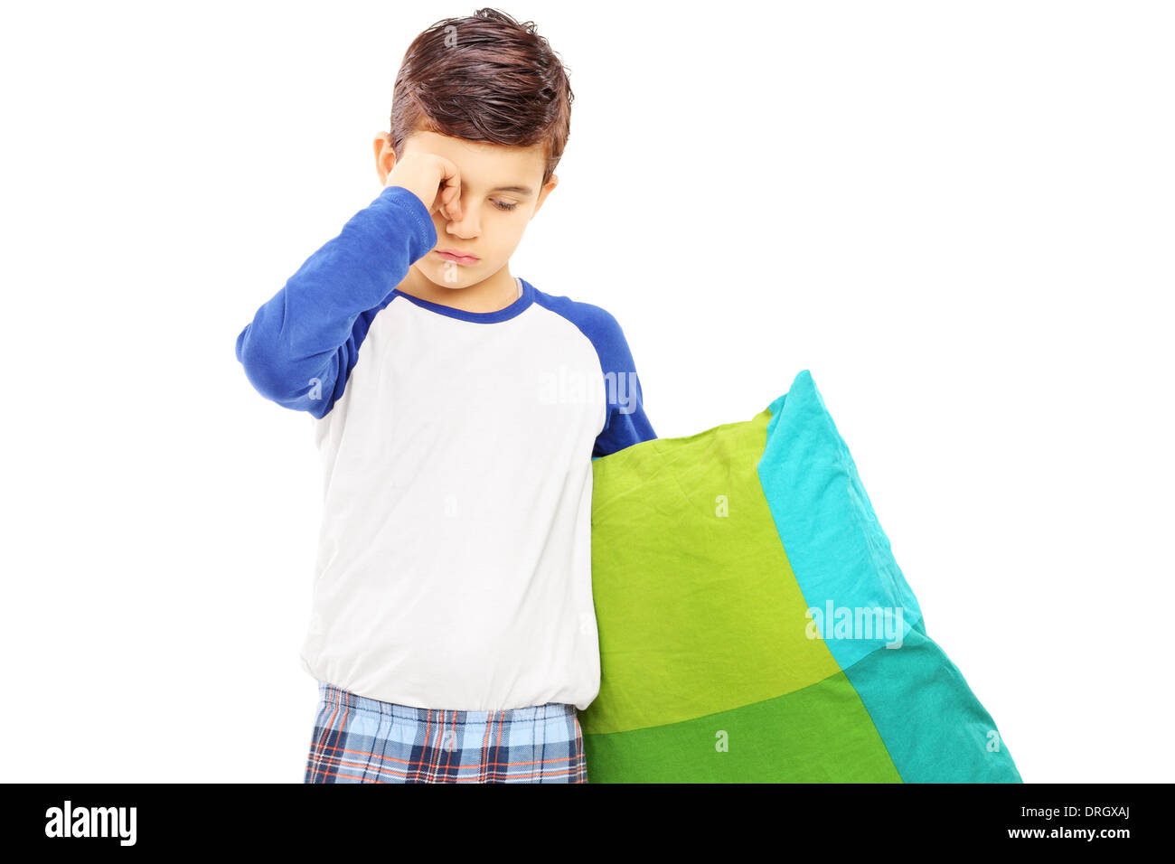 Sleepy kid holding a pillow Stock Photo Alamy