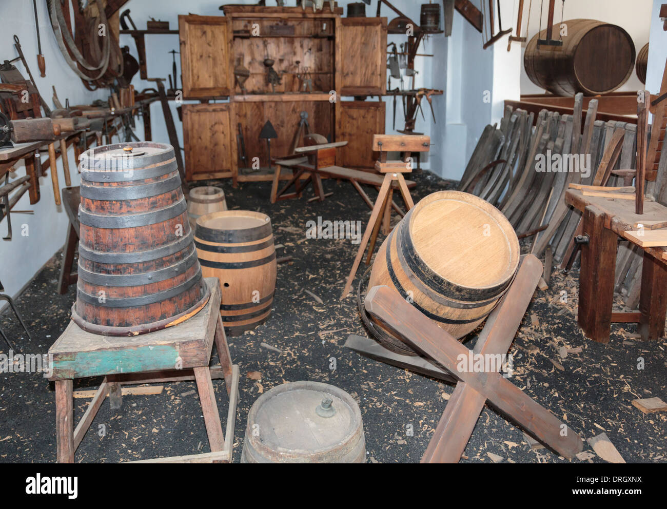 Display of barrel making tools and equipment inside Museo del Vino El Grifo museum in wine growing region of La Geria, Lanzarote Stock Photo