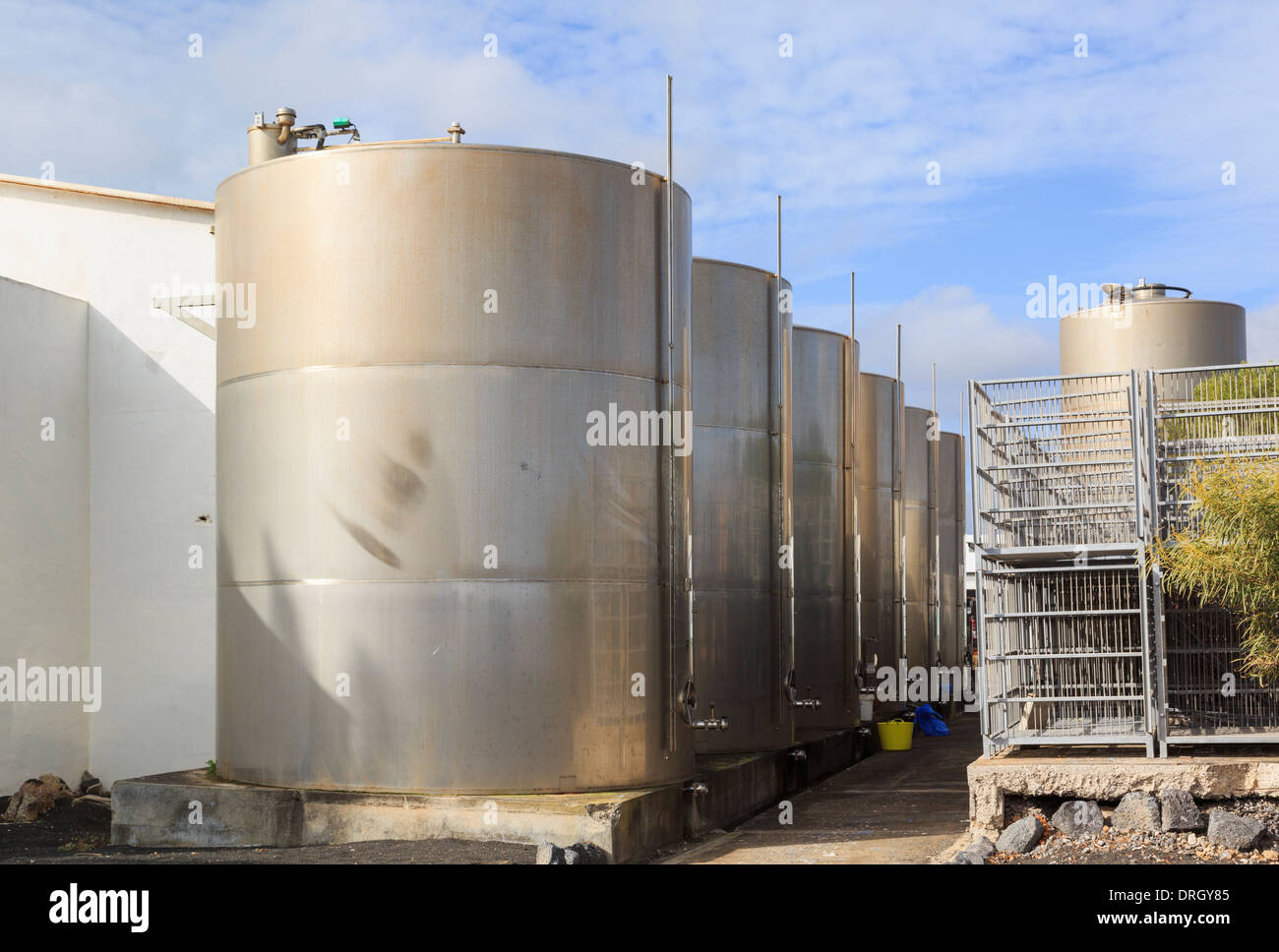 Large wine vats outside bodega del Vino El Grifo in wine growing region of La Geria near San Bartolome Lanzarote Canary Islands Stock Photo