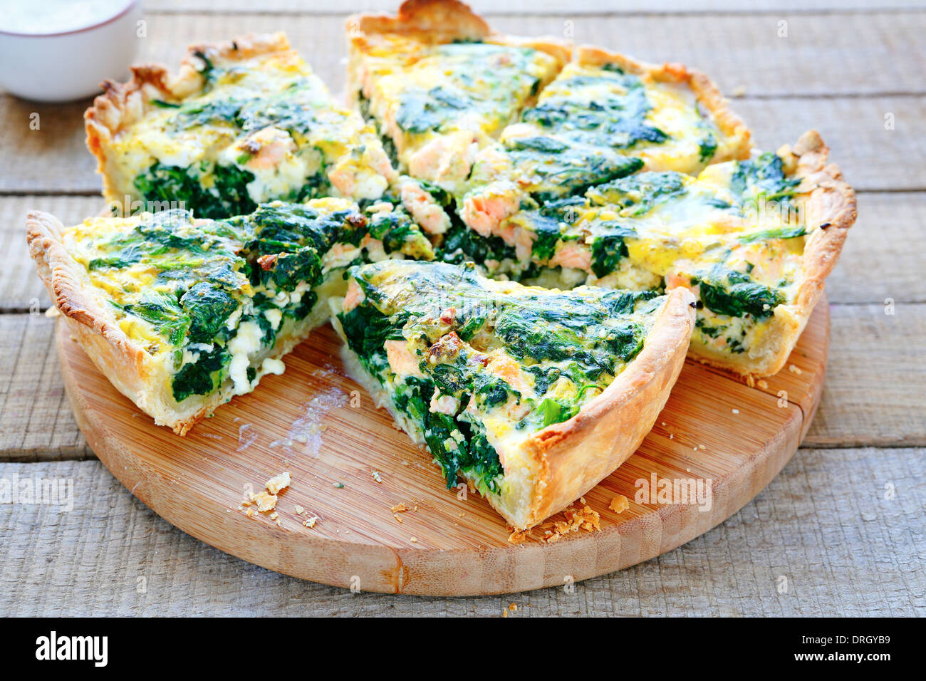 Round PIE with spinach and fish, food closeupop Stock Photo - Alamy
