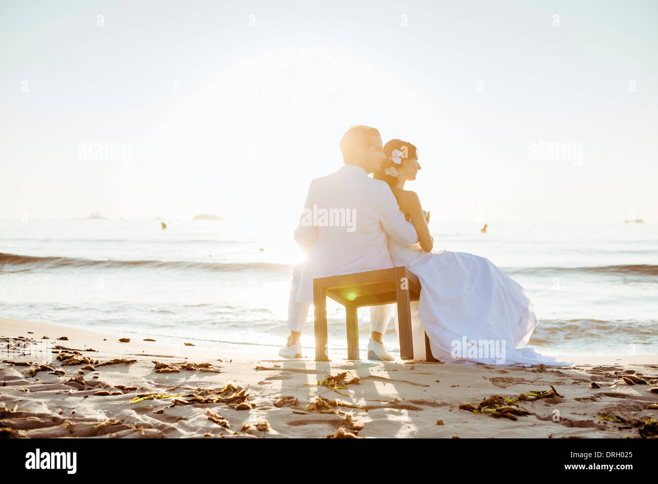 Brautpaar am Strand auf Ibiza, Spanien - bridal couple at the Beach, Ibiza, Spain Stock Photo