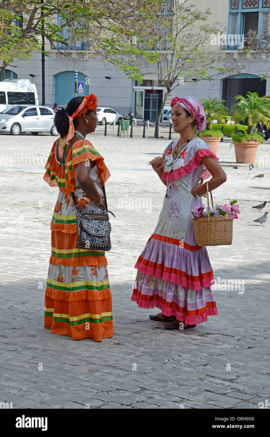 Two women in traditional costume, Old Town, Havana, Cuba Stock Photo - Alamy
