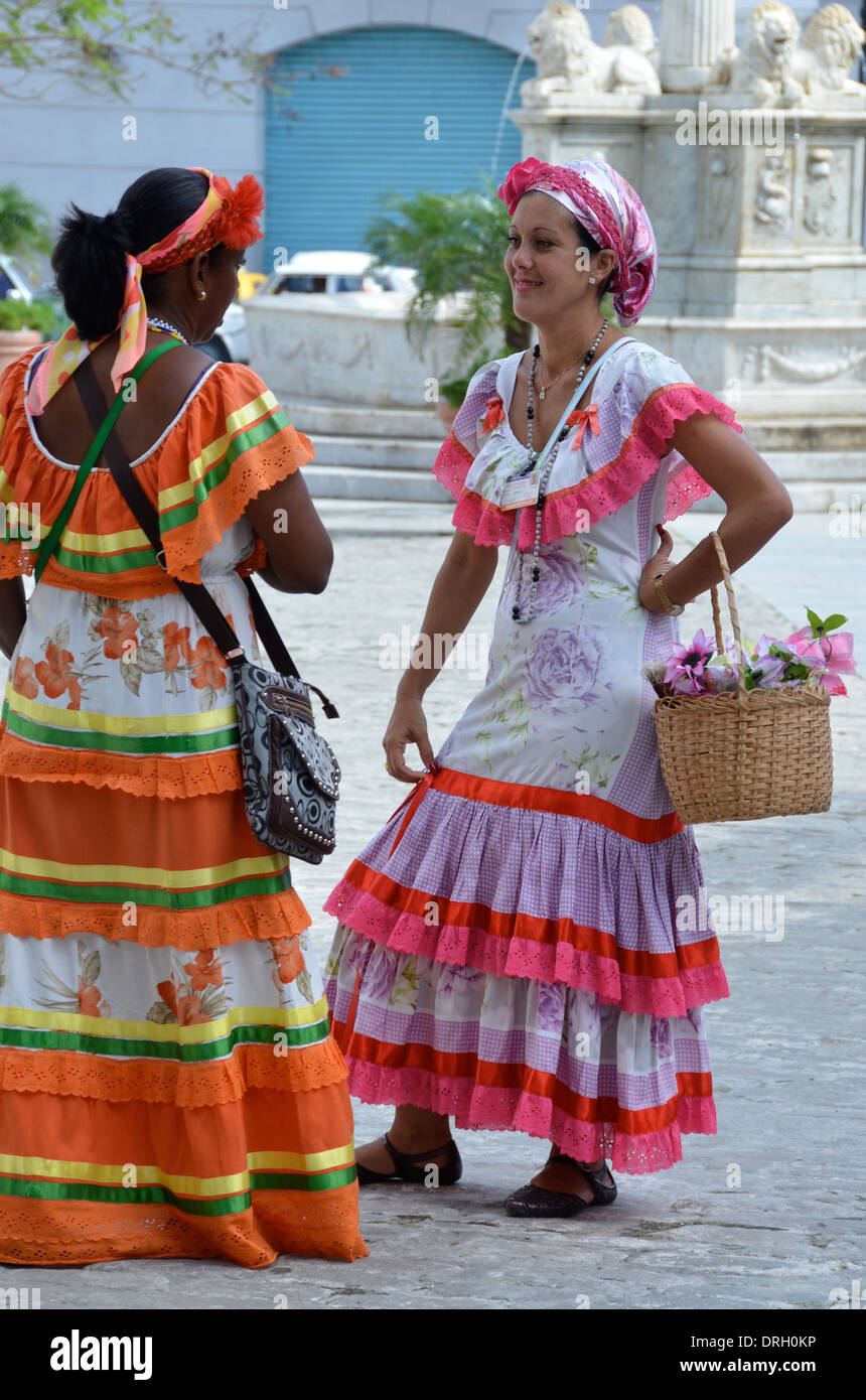 Two women in traditional costume, Old Town, Havana, Cuba Stock Photo
