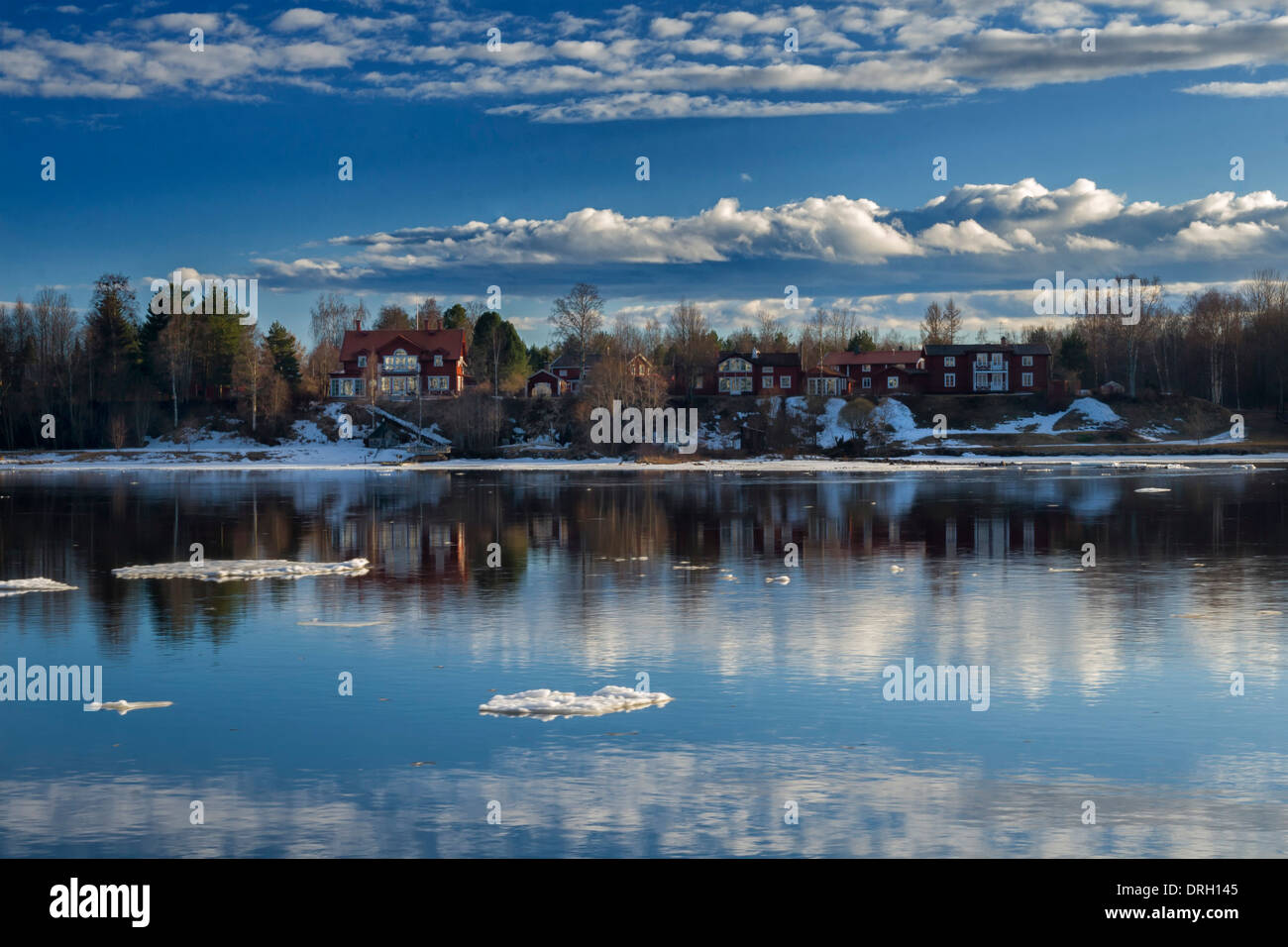 Typical wood houses next to the Ume river, Umeå , Sweden Stock Photo