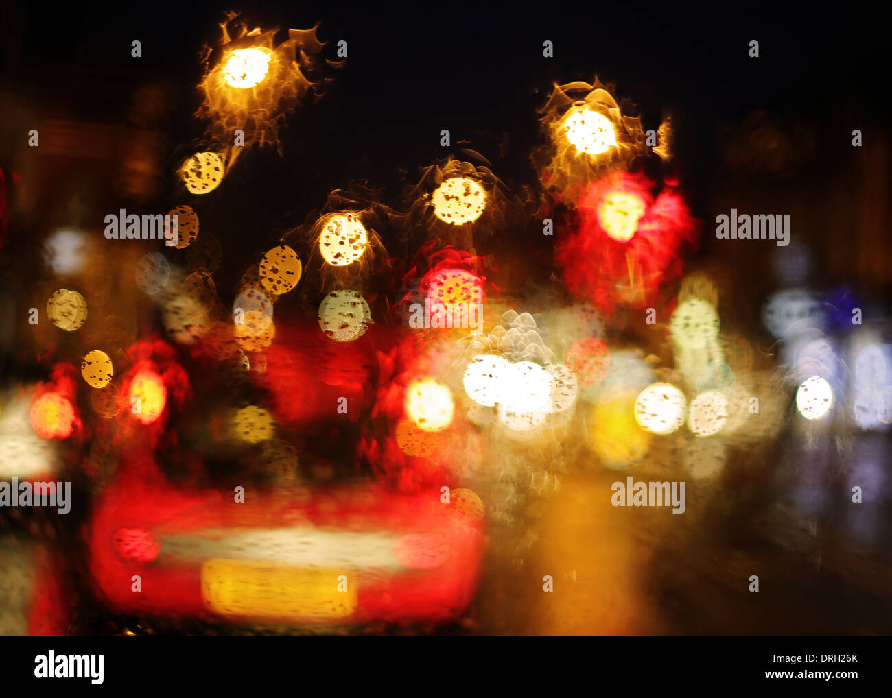 Lights taken through raindrops on glass at night Stock Photo Alamy