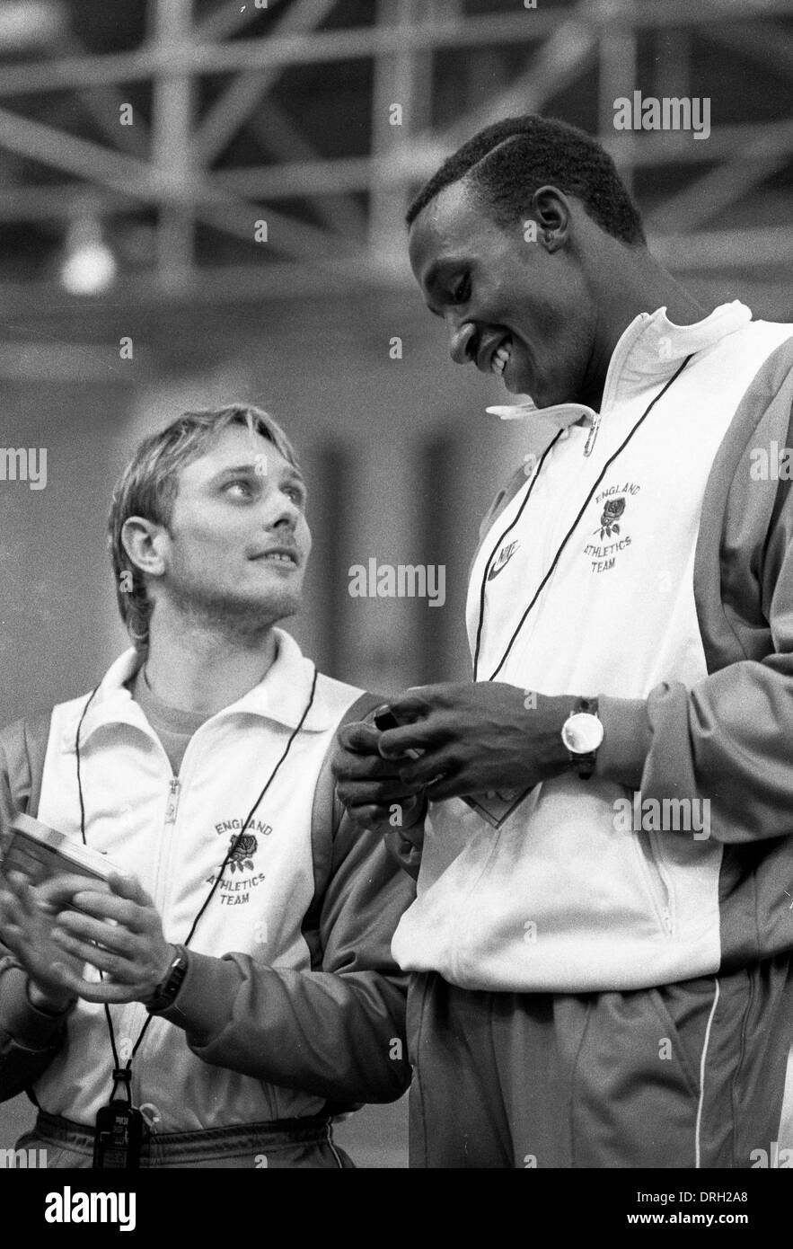 Linford Christie and Todd Bennett on podium for 200m Kodak Classic Athletics Britain v USA at RAF Cosford March 1986 Stock Photo