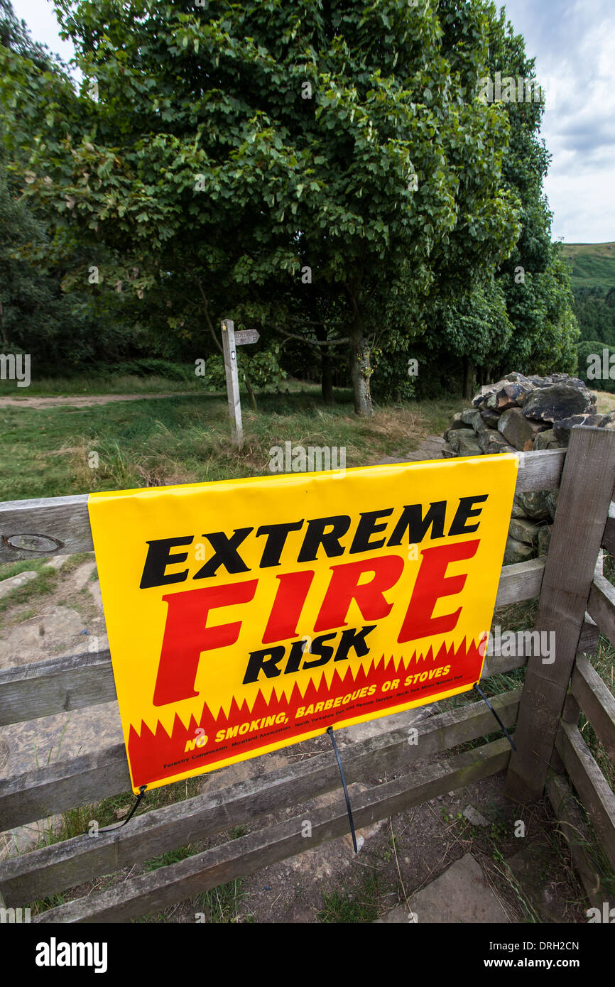 Fire Rist Sign Fire Risk signs on gate leading to Hasty Bank, North Yorkshire, England ...