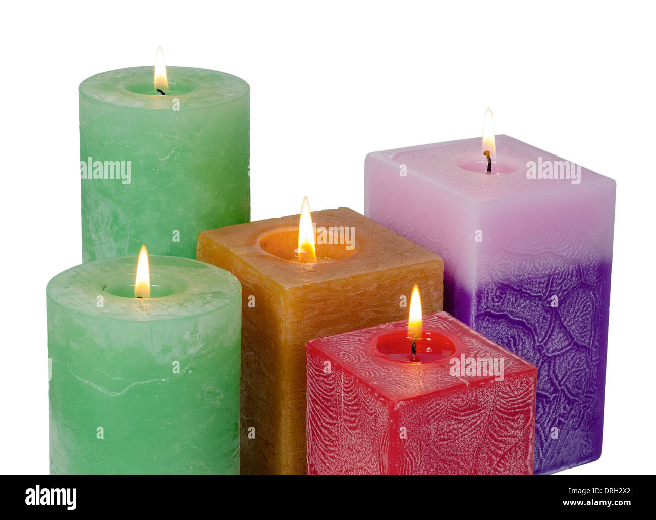 Pillar wax candle burning on white background Stock Photo - Alamy